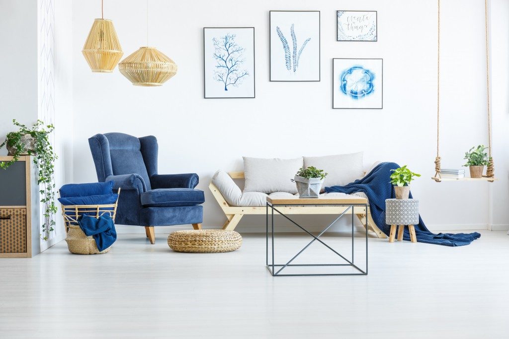blue sofa in a white living room
