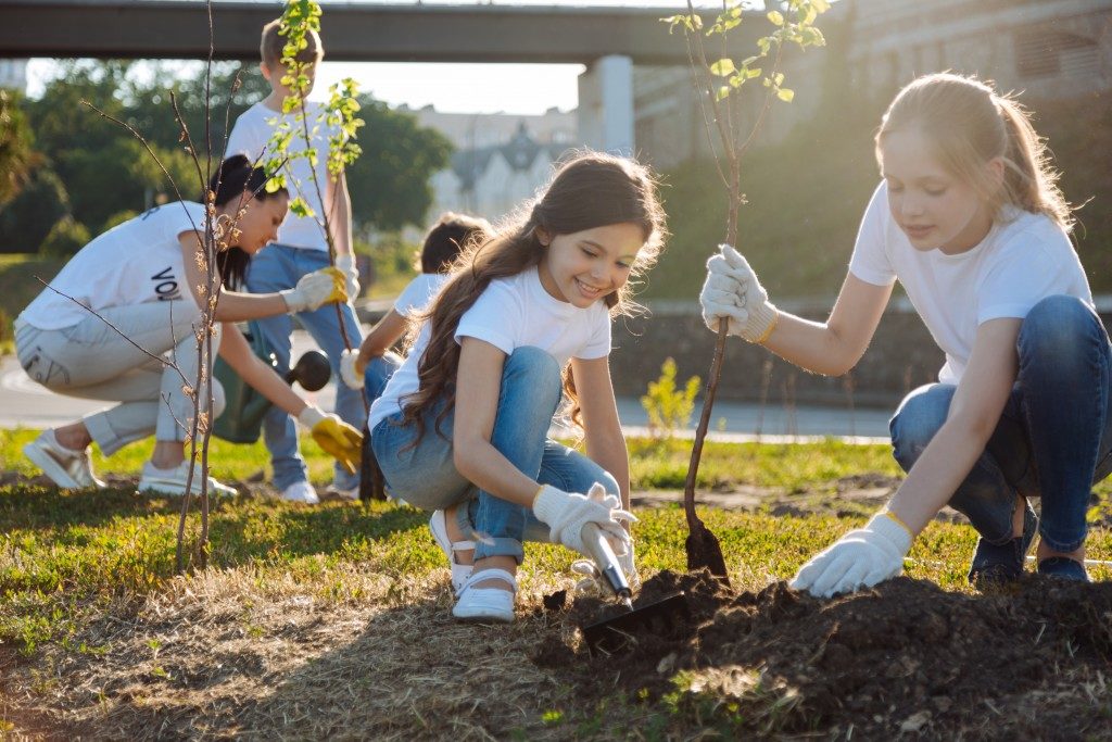 Girls planting trees