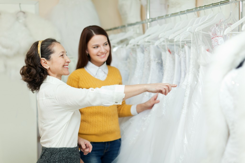 bride choosing her wedding dress