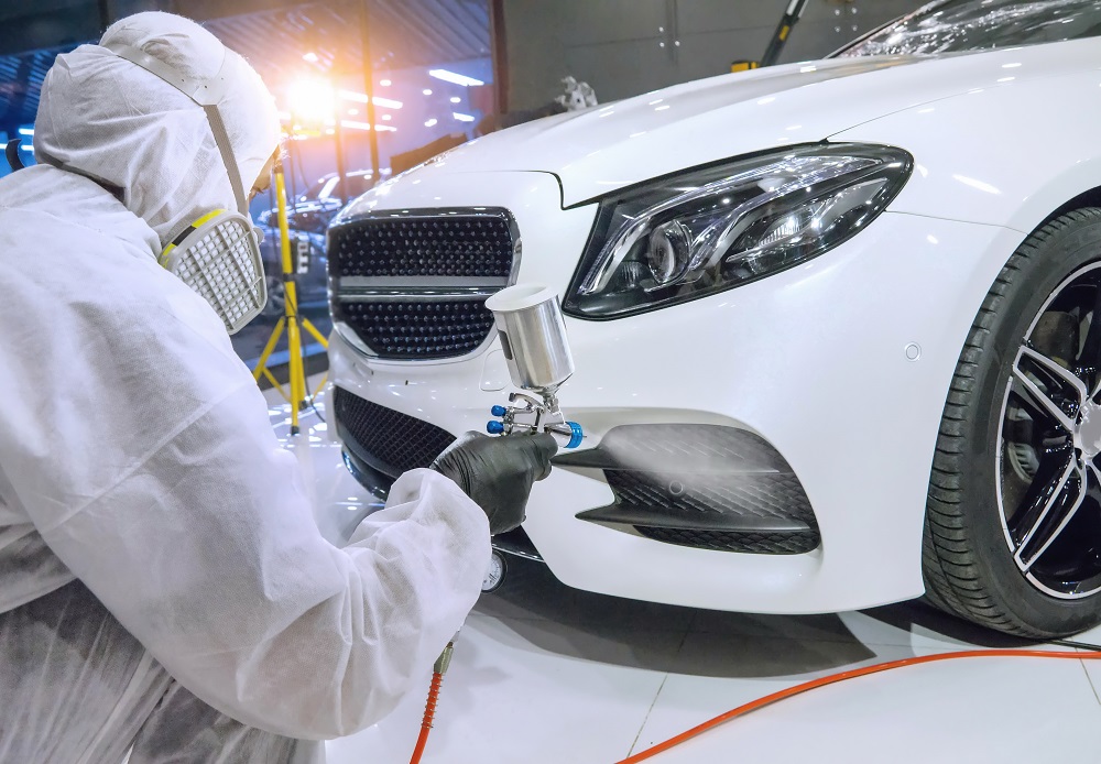 spray painting a car