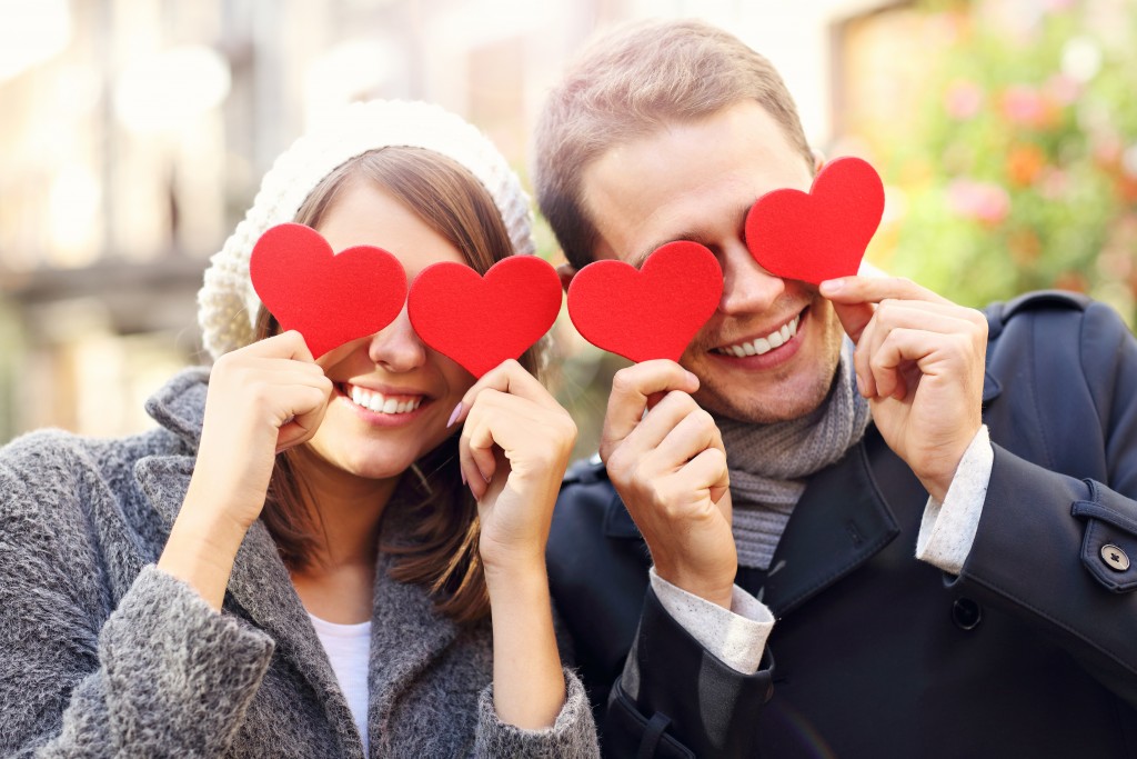 heart cutouts with couple