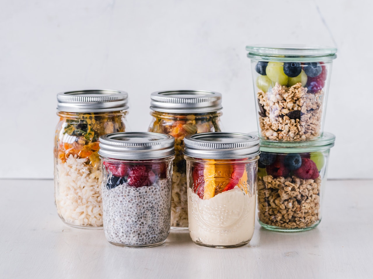 jar filled with fruits and nuts