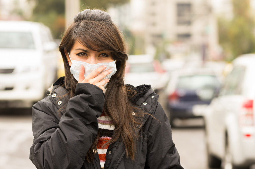 woman covering mouth