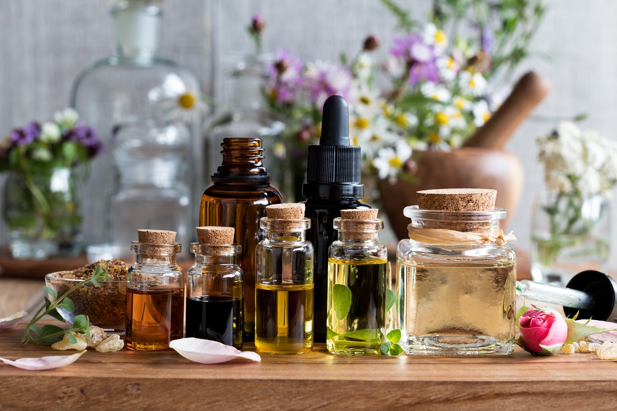 small glass vials filled with essential oils