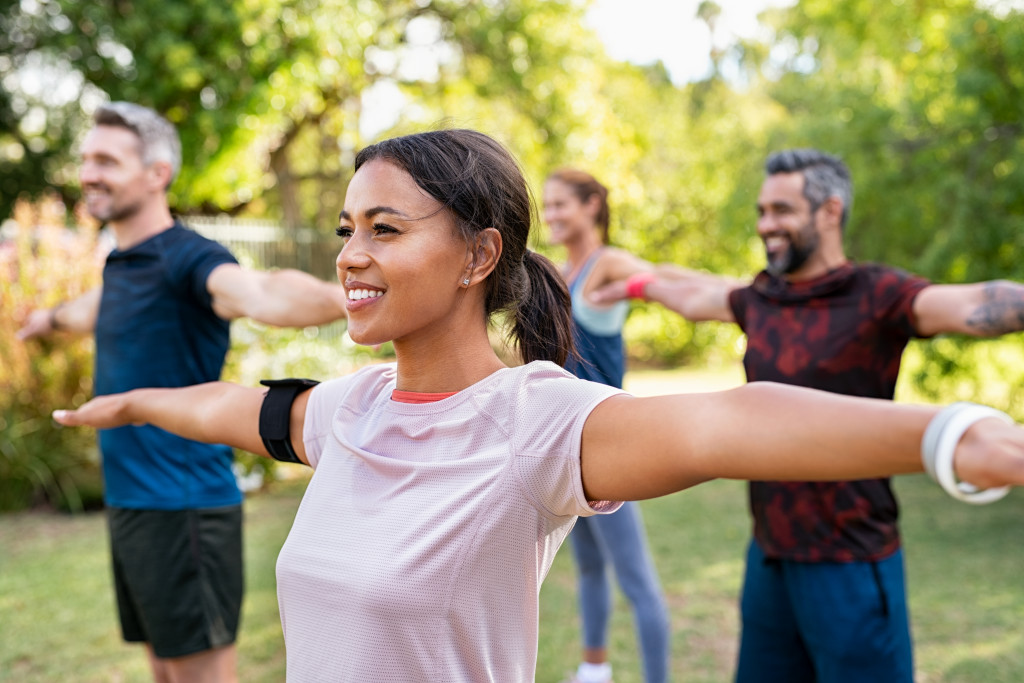 People stretching in the park